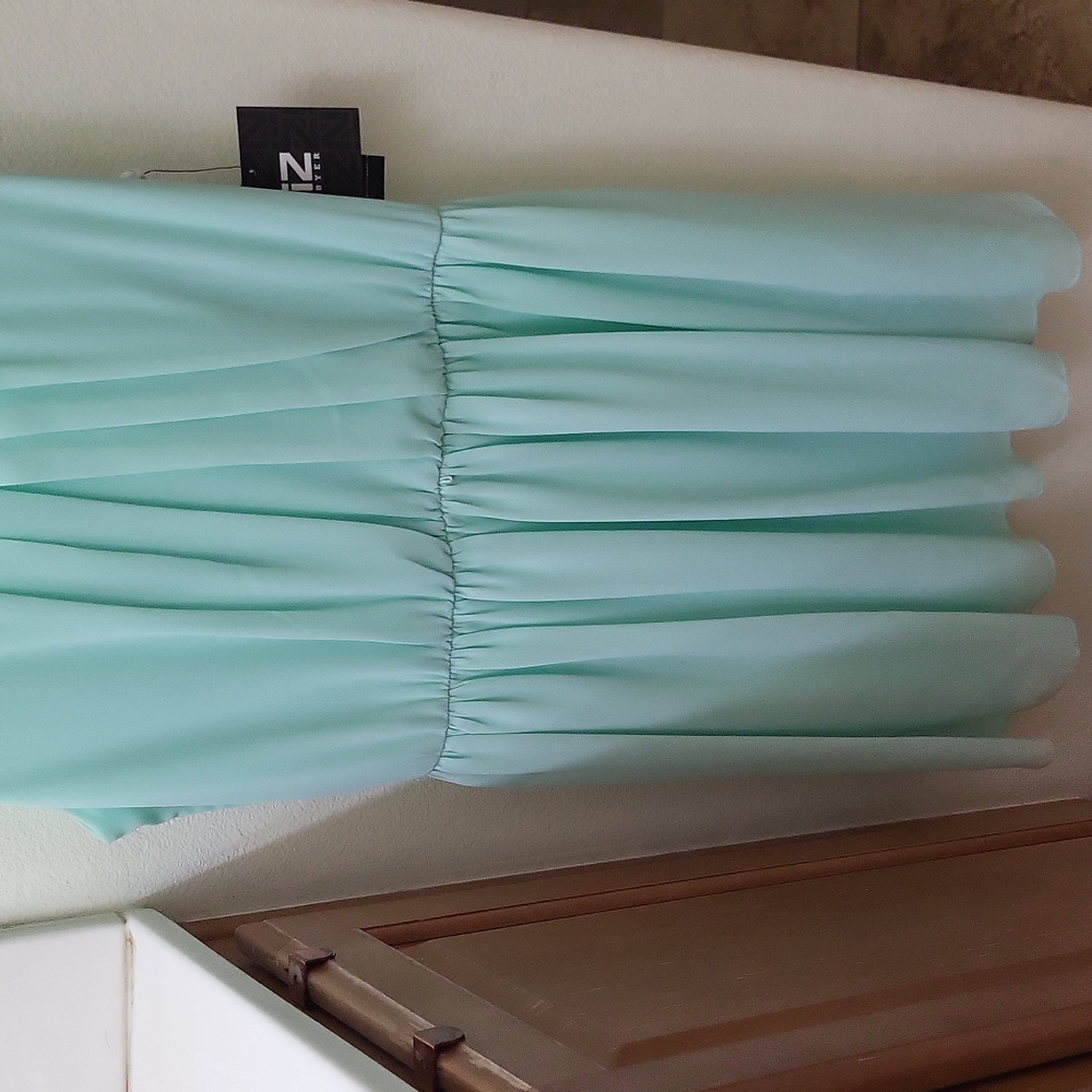 Light green dress with tag